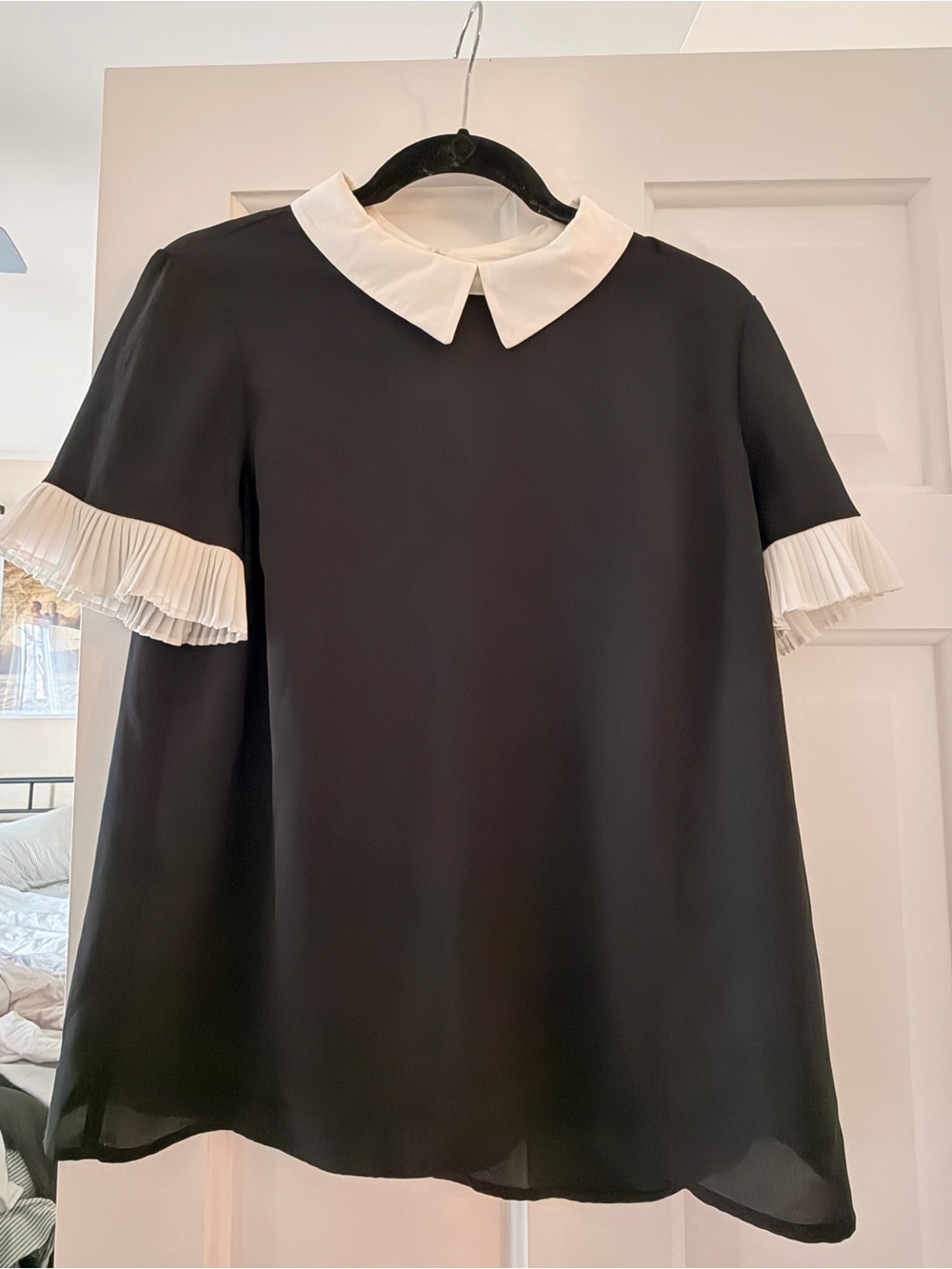 CeCe Black Blouse with White Peter Pan Collar and Pleated Sleeve Cuffs